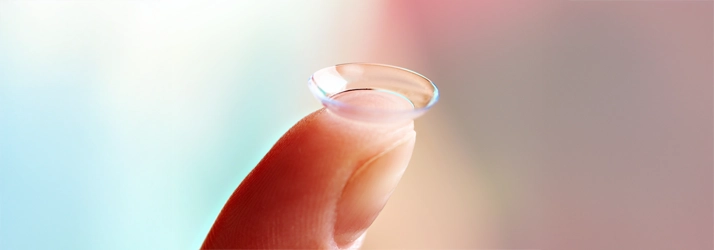 Eye Doctor Cape Girardeau MO Contacts A person holding a contact on their finger tip.